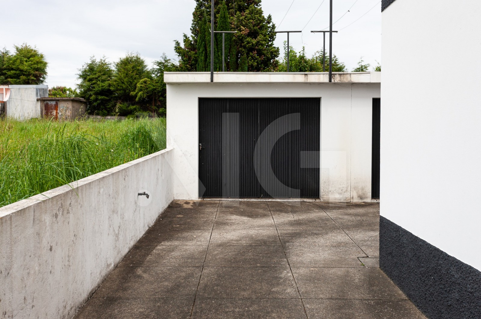 Moradia T3 para Venda em Castêlo da Maia, Maia, Porto - Parqueamento/Garagem (Imagem 1)